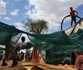 MSF water and sanitation teams deliver clean drinking water from trucks in Aby Aday IDP camp in Tigray, Ethiopia.
