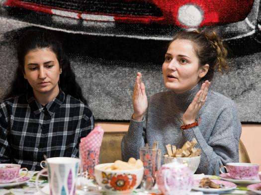 Women speak to one another in a group therapy session held by MSF in Ukraine.