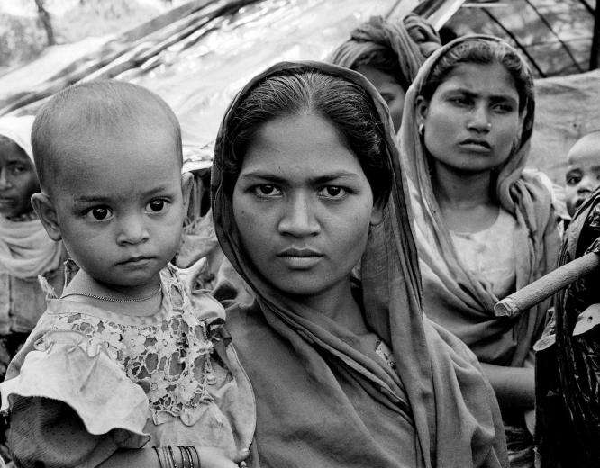 A Rohingya woman with her child. 